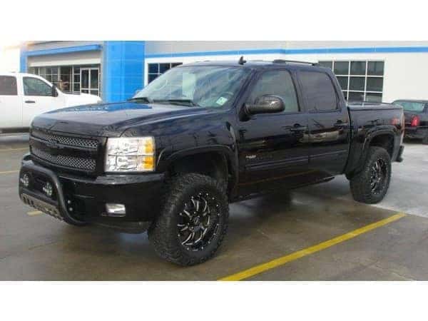 dungeon-garage-slider-11-mobile Black lifted Custom Chevy truck