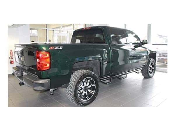 dungeon-garage-slider-15-mobile Green lifted Chevy Truck