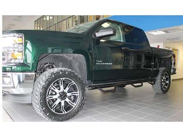 dungeon-garage-slider-17-mobile Front of Green lifted Chevy Truck