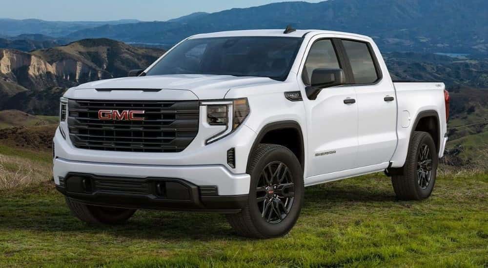 White 2024 GMC Sierra 1500 parked on grass