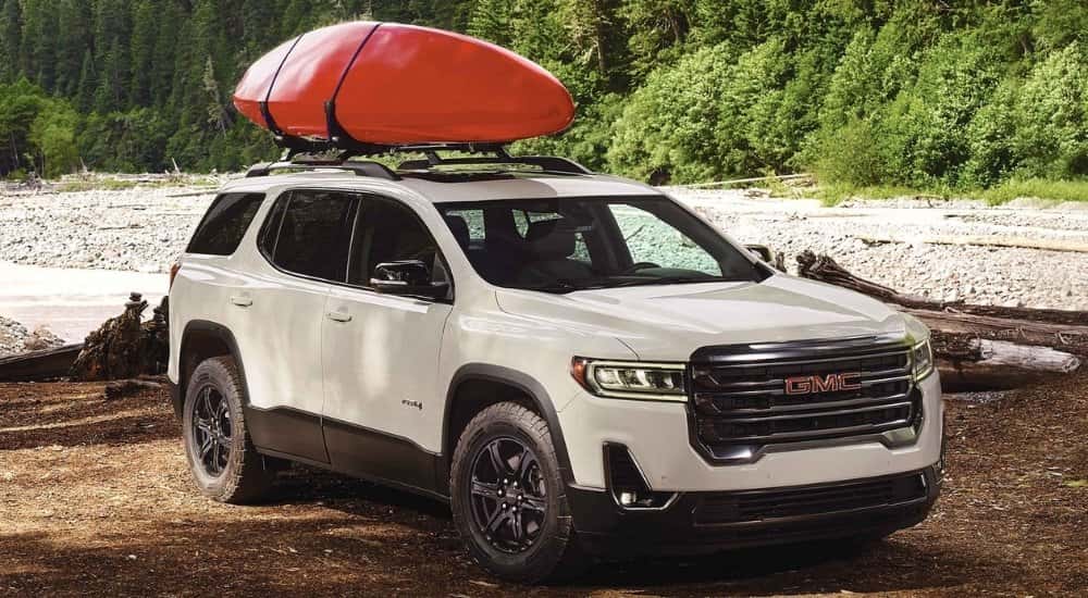 White 2022 GMC Acadia parked off-road