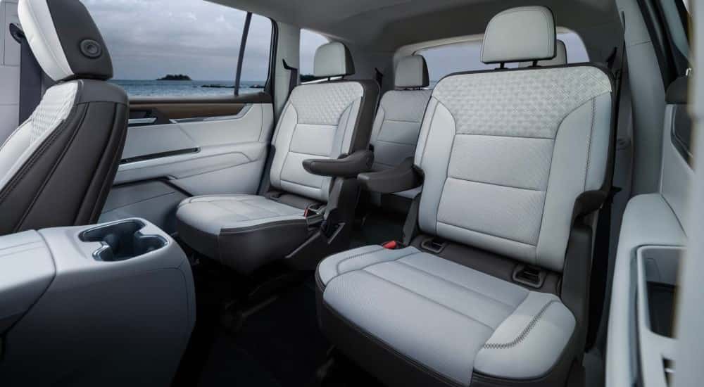 Black and light gray interior in a 2025 GMC Acadia Denali for sale