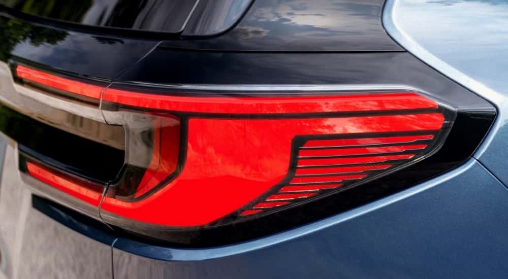 Taillight on a blue 2025 GMC Acadia Denali 
