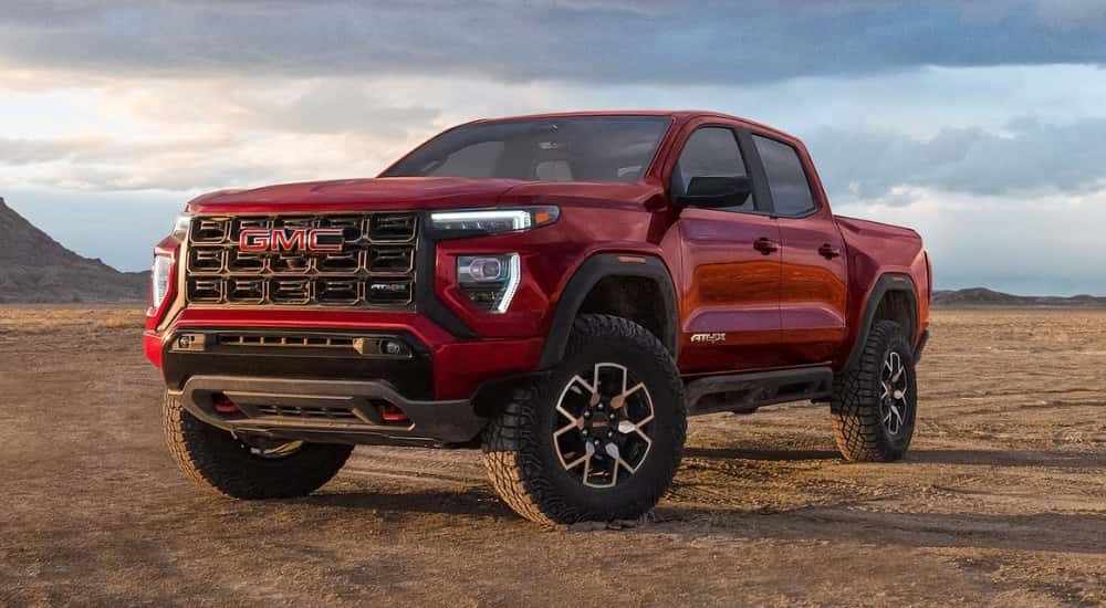 Red 2026 GMC Canyon AT4X for sale parked off-road
