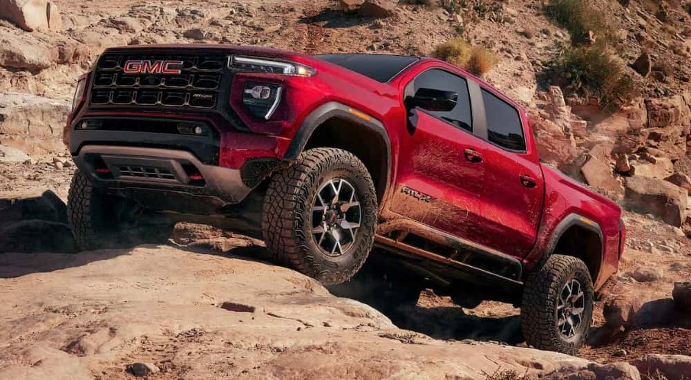 Red 2026 GMC Canyon AT4X off-roading