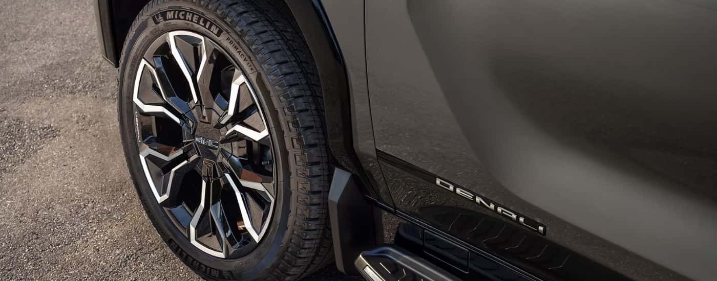 Front driver side wheel on a grey 2024 GMC Sierra EV Denali