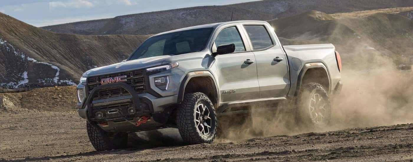 Grey 2026 GMC Canyon AT4X off-roading
