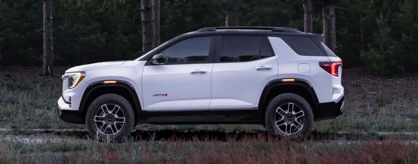 White 2026 GMC Terrain AT4 parked off-road