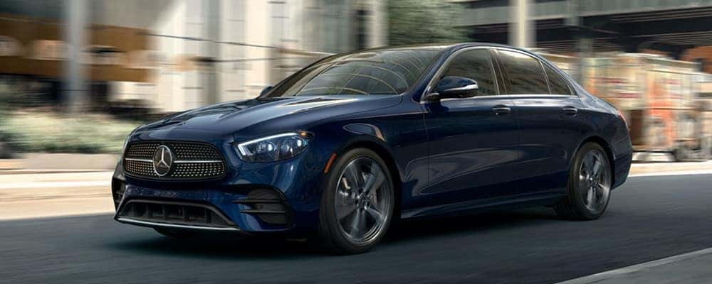 Mercedes-Benz speeds along city street