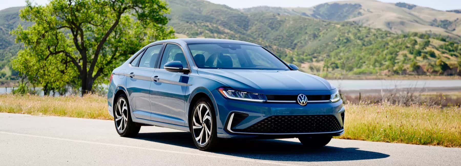 2026-VW-Jetta-drives-country-road