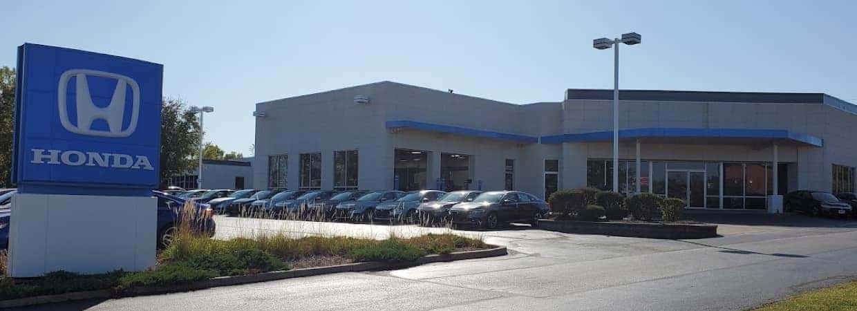 An exterior shot of a Honda dealership