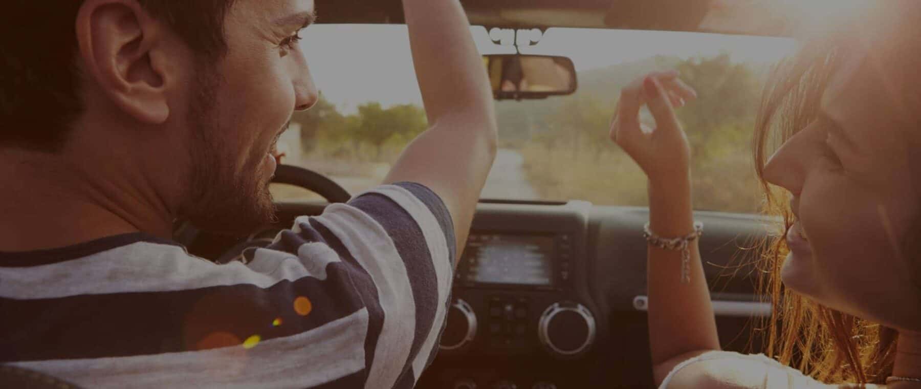 People Smiling in the car