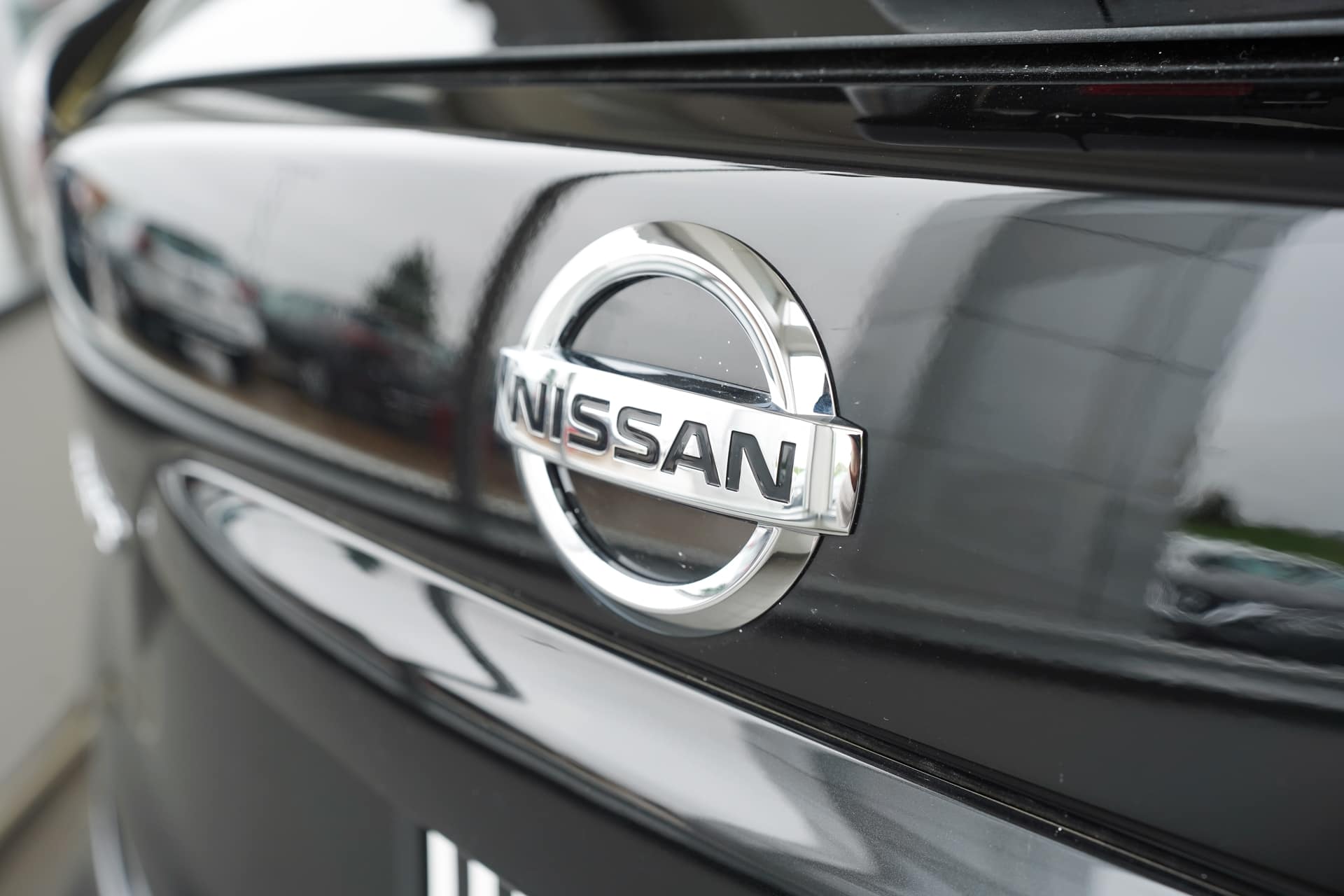 Close up of the Nissan emblem