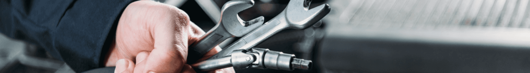 A hand holding tools