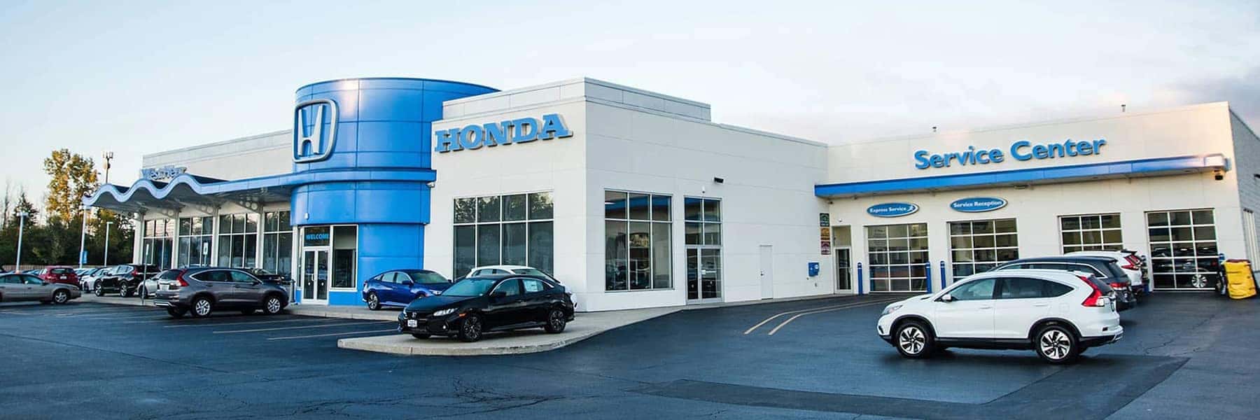 An exterior shot of a Honda dealership.