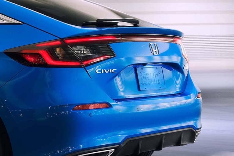 Closeup of a blue 2022 Honda Civic trunk_mobile