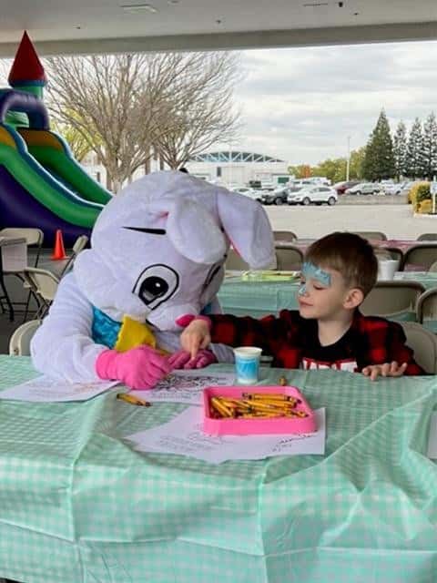 Easter-bunny-and-small-boy-coloring-together