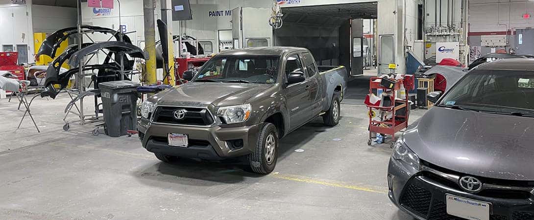 cars parked in body shop