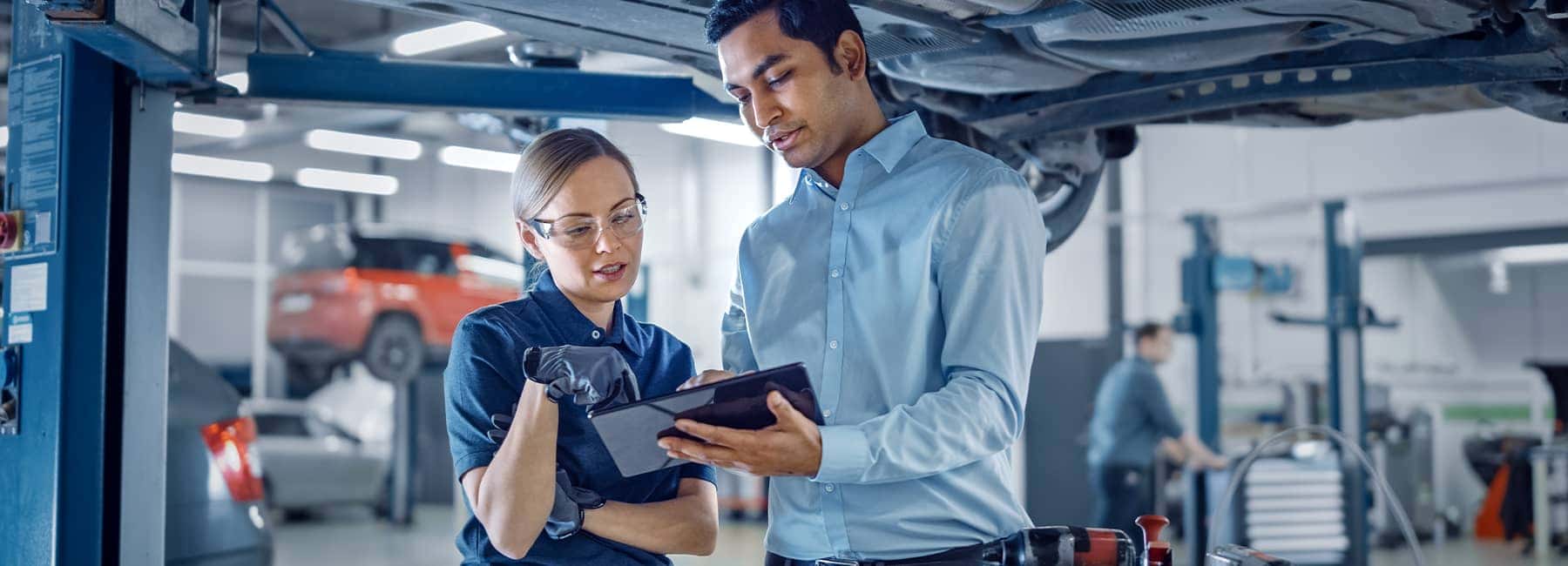 Two-mechanics-review-a-work-order-in-a-service-shop