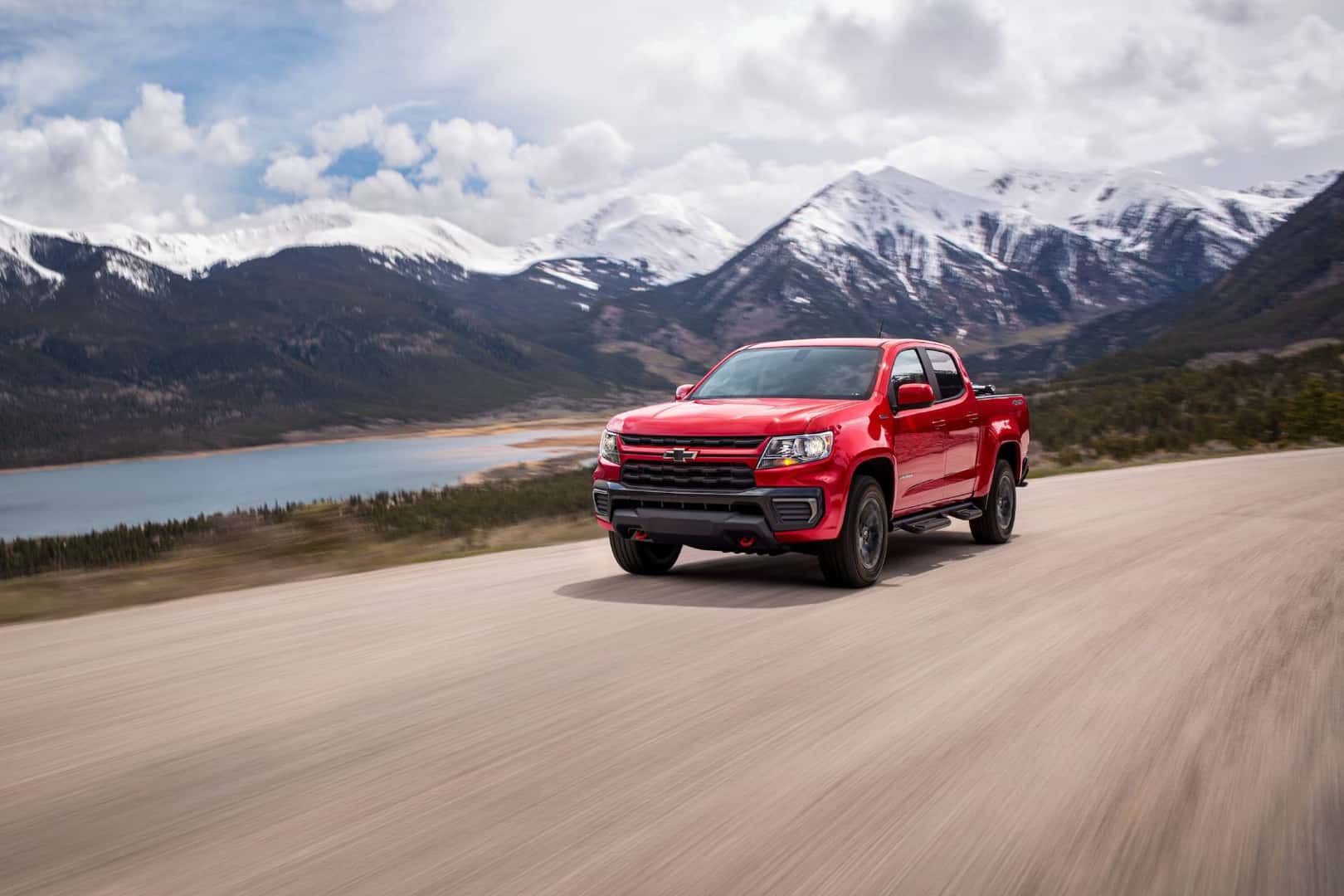 2022-Chevrolet-Colorado-driving-with-the-mountains-in-the-background
