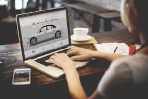 Car Buying on Laptop