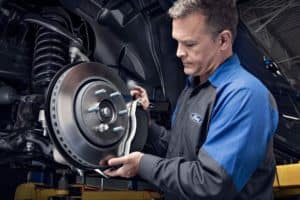 Ford Technician Replacing Brakes
