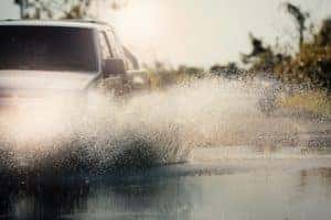 Truck Driving Through Water